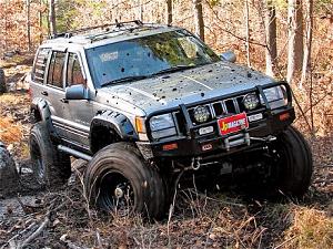 Click image for larger version. 

Name:	154_0805_15_z+1997_jeep_grand_cherokee_turd_chaser+front_view.jpg‏ 
Views:	239 
Size:	61.7  
ID:	20313